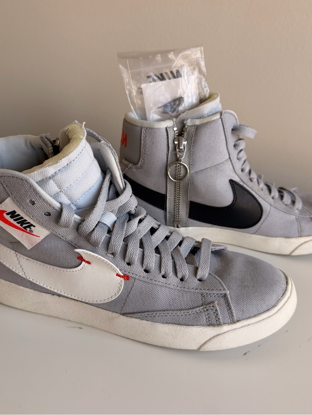Nike High-Top Canvas Sneakers in Light Gray with Black Swoosh